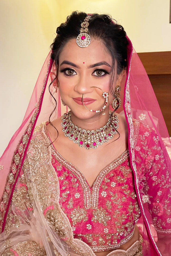 Reception makeup look with glamorous eye makeup by Nithika Aroraa
